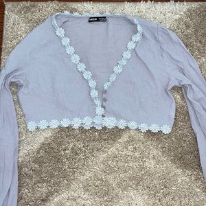 Purple long sleeve cropped button up flower crop top